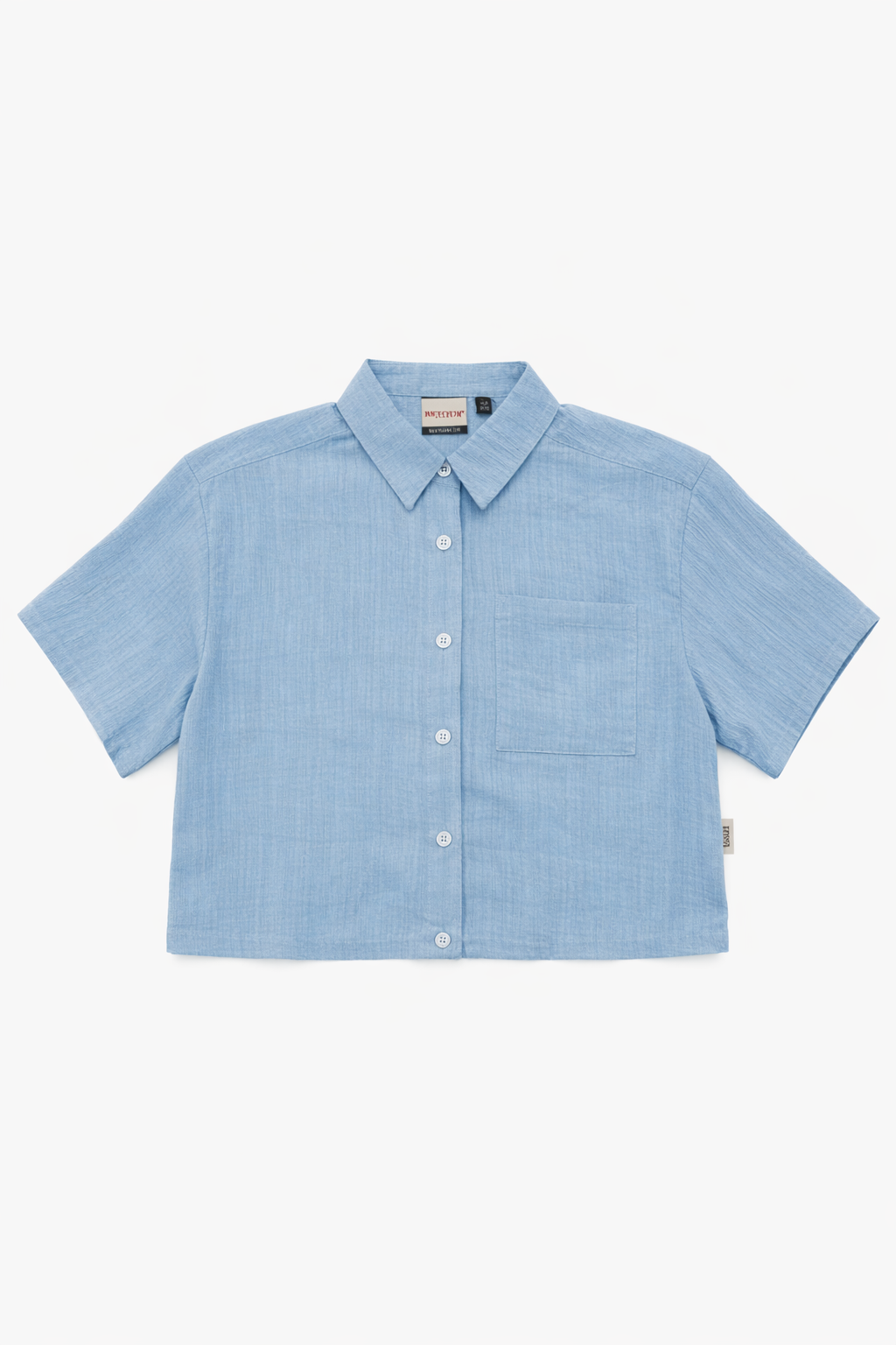 Camicia corta azzurra – stile fresco e moderno