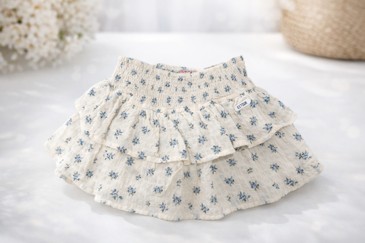 Gonna bambina a balze con micro fiori azzurri